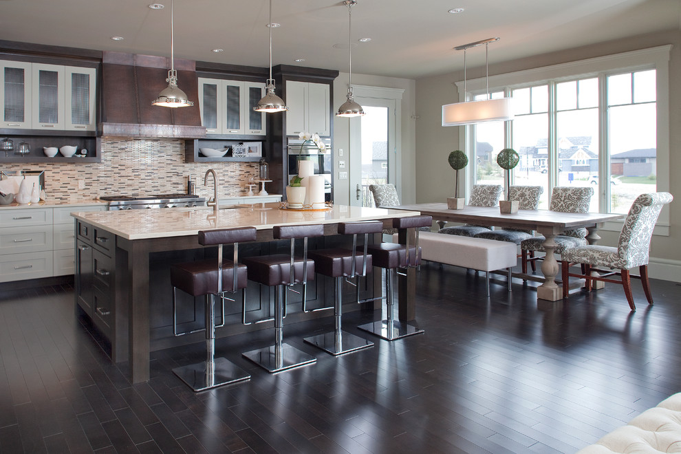 Inspiration for a contemporary kitchen in Calgary with glass-front cabinets and stainless steel appliances.