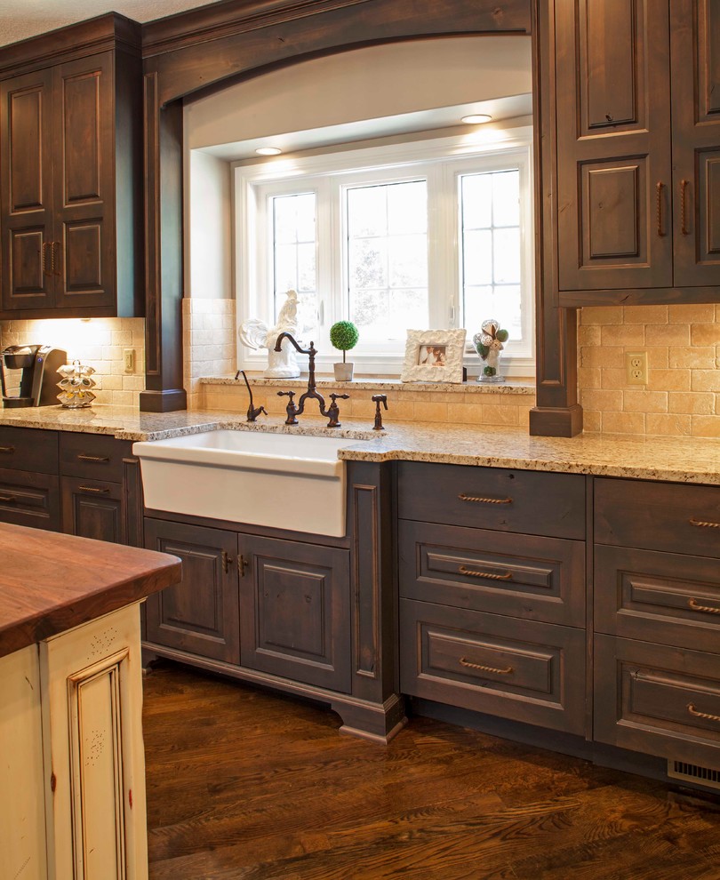 Rustic Alder cabinetry with painted and glazed island 