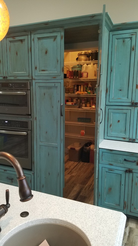 This is an example of a rustic kitchen in Burlington.