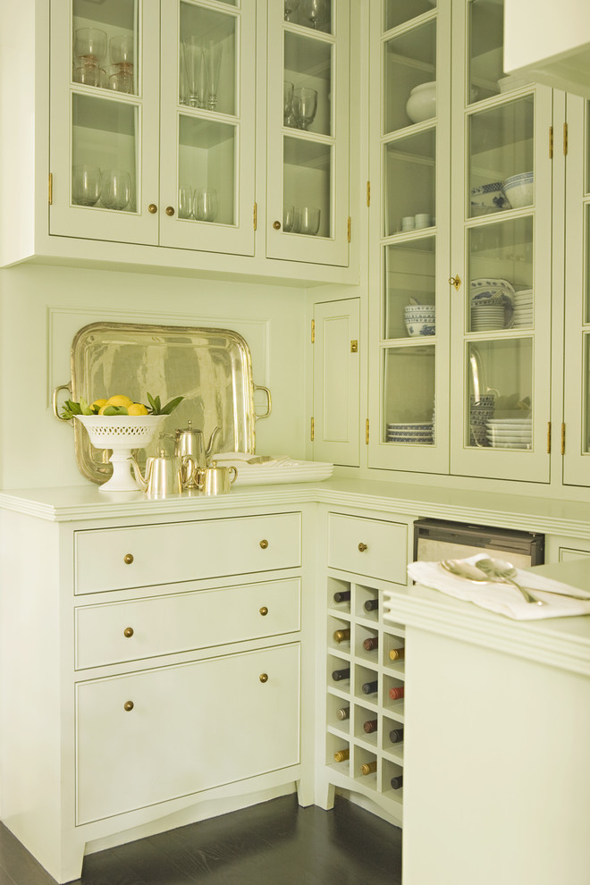 Transitional kitchen photo in Los Angeles with glass-front cabinets and white cabinets