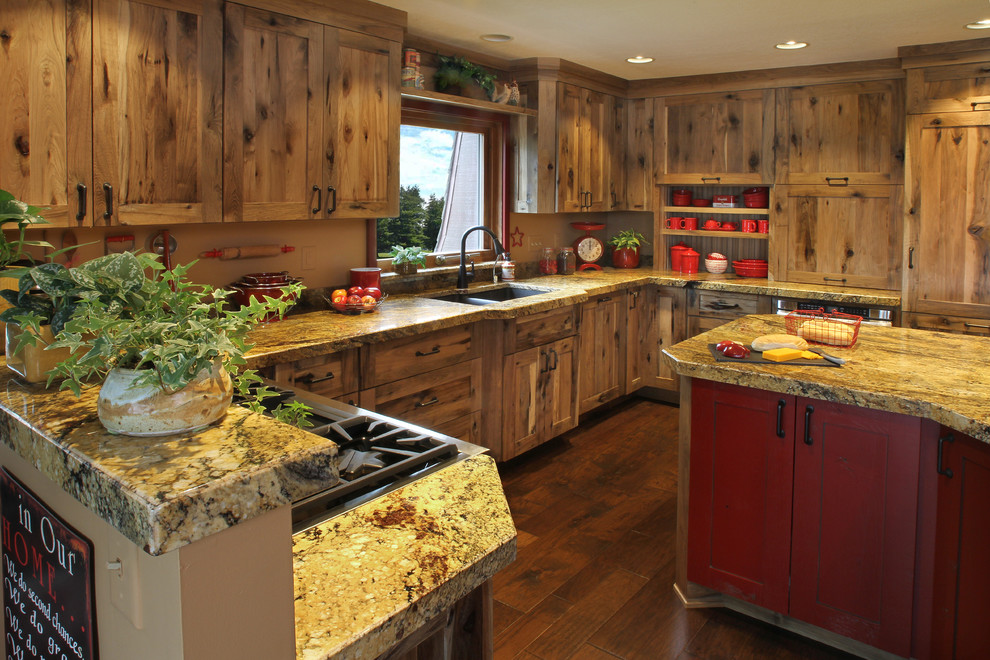 Inspiration for a large farmhouse u-shaped kitchen pantry in Minneapolis with shaker cabinets and an island.