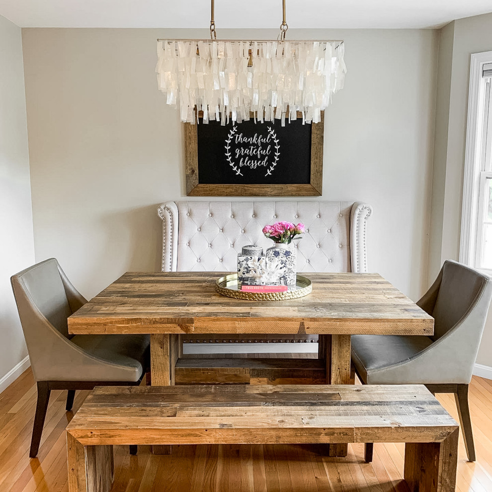 This is an example of a rustic dining room in Boston.