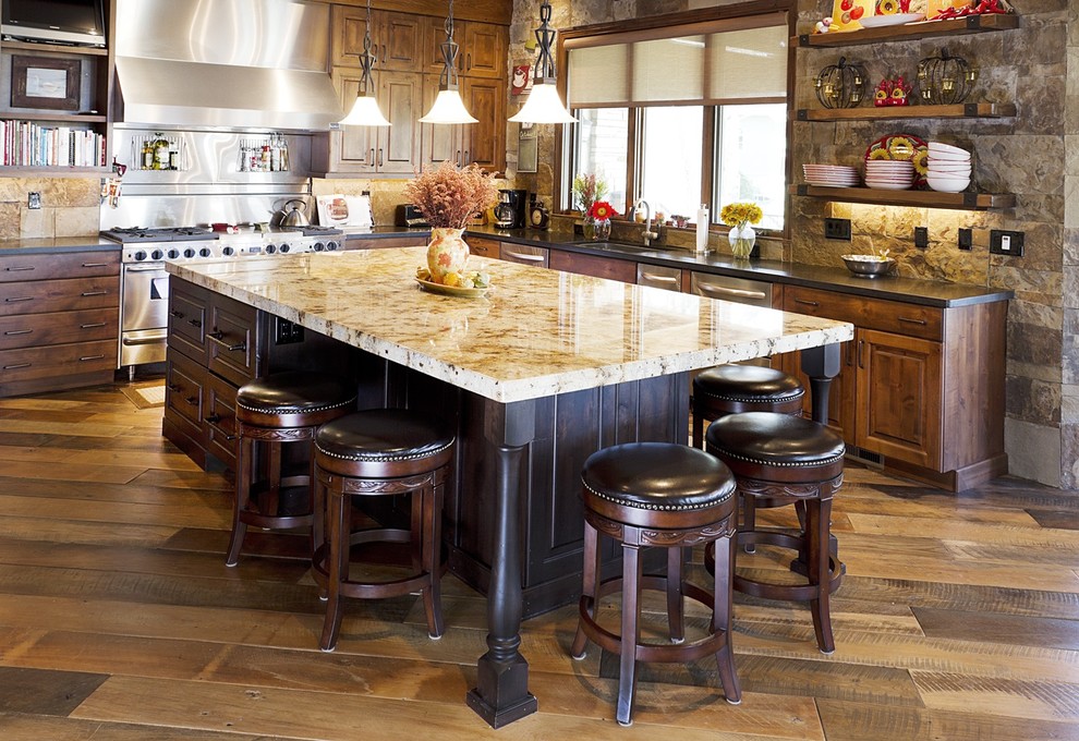 Photo of a traditional kitchen in Denver with stainless steel appliances.