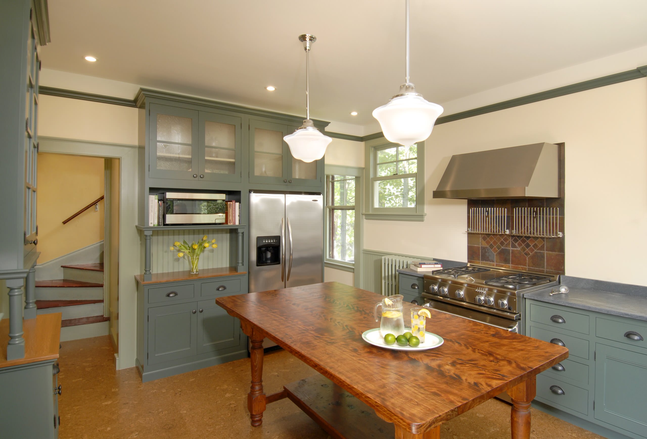 Sage green kitchen in a renovated Victorian home, Southport