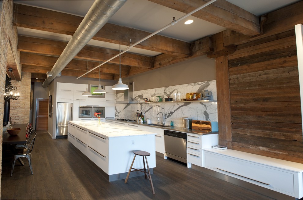 Example of a mountain style kitchen design in Chicago with stainless steel appliances