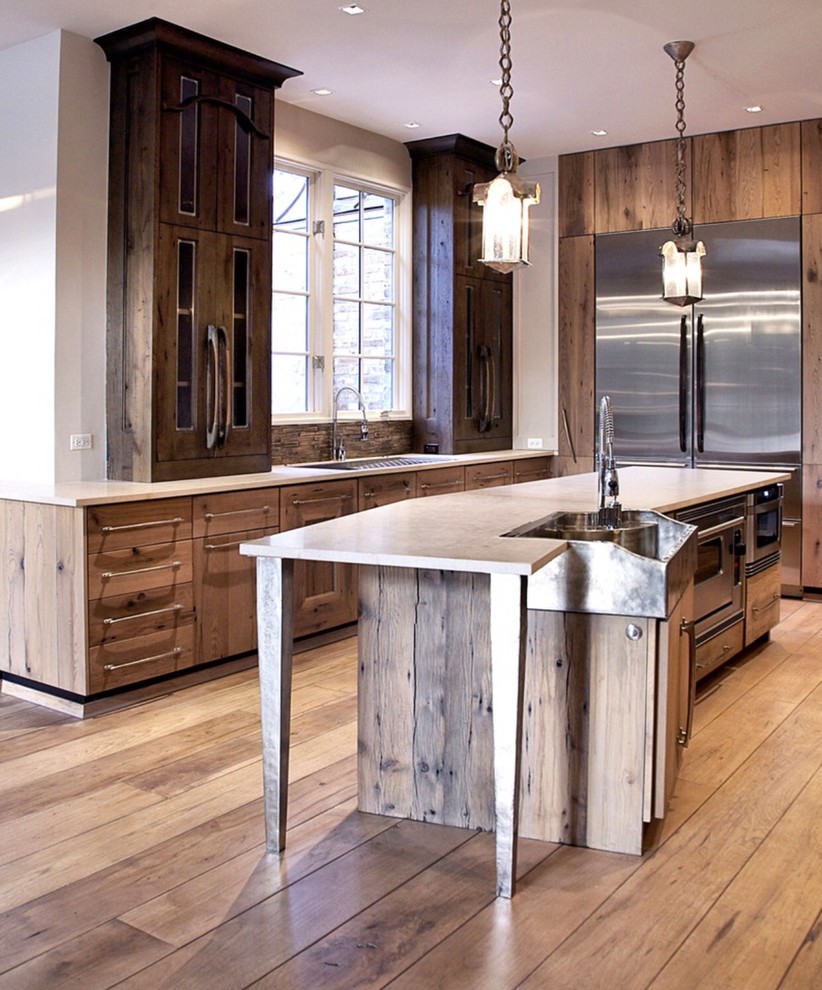 Example of a large mountain style galley painted wood floor eat-in kitchen design in Chicago with an undermount sink, flat-panel cabinets, distressed cabinets, marble countertops, brown backsplash, stone tile backsplash, stainless steel appliances and an island