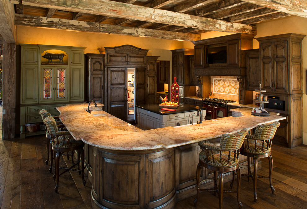 Design ideas for a rustic kitchen in Houston with raised-panel cabinets, dark wood cabinets and integrated appliances.