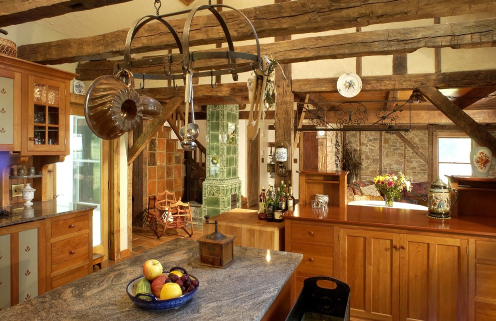 Idéer för att renovera ett kök, med en rustik diskho, skåp i ljust trä, granitbänkskiva och integrerade vitvaror