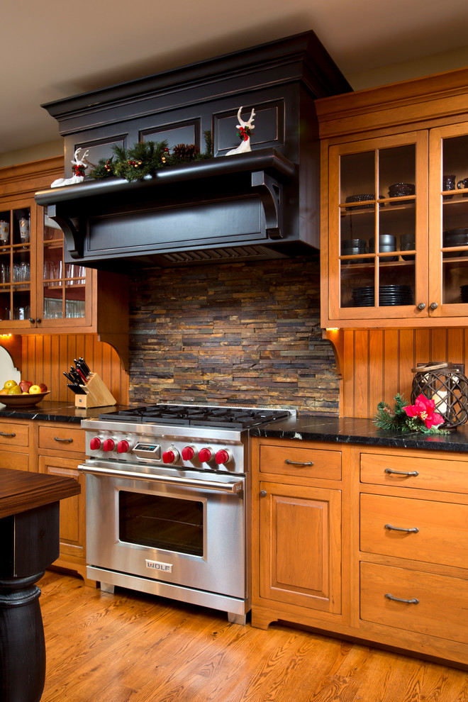 Inspiration for a timeless kitchen remodel in Boston with stainless steel appliances and slate backsplash