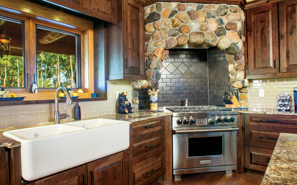 This is an example of a rustic kitchen in Calgary.