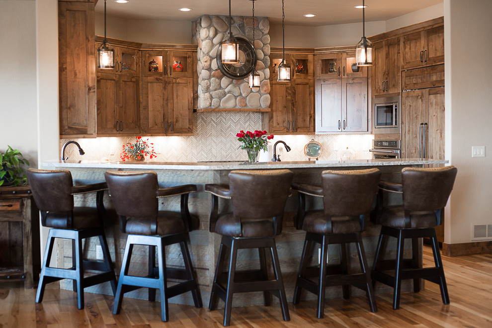 Example of a mountain style kitchen design in Denver