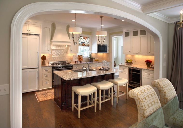 Eat-in kitchen - mid-sized traditional u-shaped dark wood floor eat-in kitchen idea in Minneapolis with a double-bowl sink, shaker cabinets, white cabinets, granite countertops, white backsplash, porcelain backsplash, paneled appliances and an island