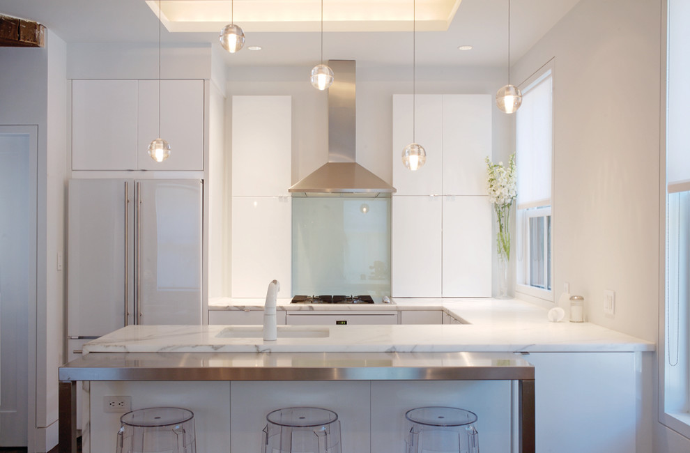 Photo of a modern kitchen in Boston with marble worktops.