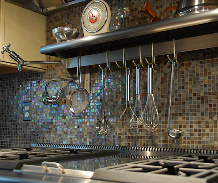 Inspiration for a timeless u-shaped medium tone wood floor eat-in kitchen remodel in New York with a double-bowl sink, beaded inset cabinets, white cabinets, granite countertops, multicolored backsplash, mosaic tile backsplash, stainless steel appliances and no island