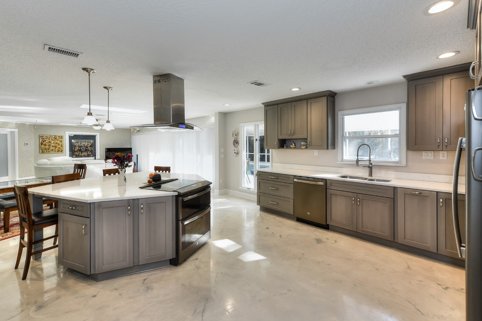 Photo of a large traditional single-wall open plan kitchen in Jacksonville with a double-bowl sink, shaker cabinets, grey cabinets, quartz worktops, white splashback, stone slab splashback, coloured appliances, concrete flooring, an island and multi-coloured floors.