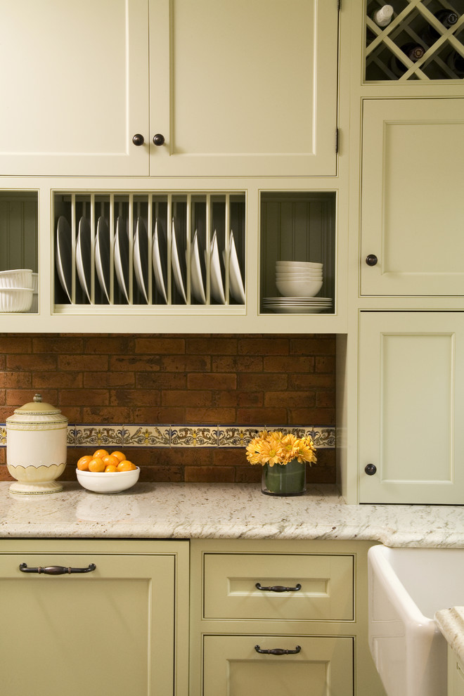 Example of a classic kitchen design in Seattle with beaded inset cabinets and beige cabinets