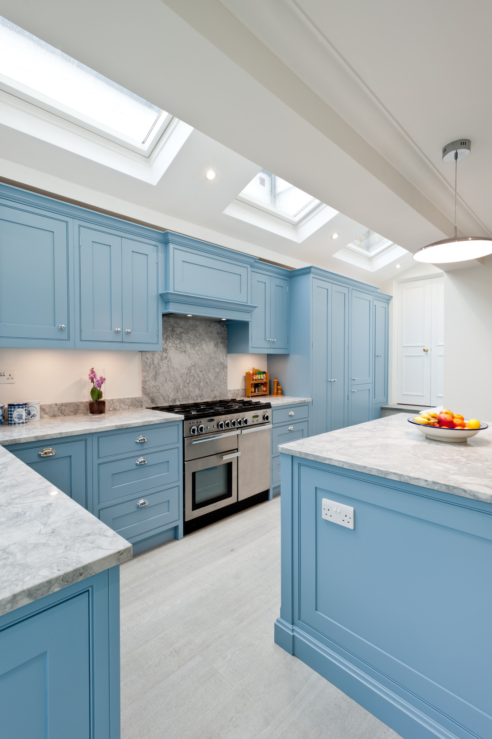 Powder Blue Pantry Cabinets with Light Gray Wood Like Floor Tiles -  Transitional - Kitchen