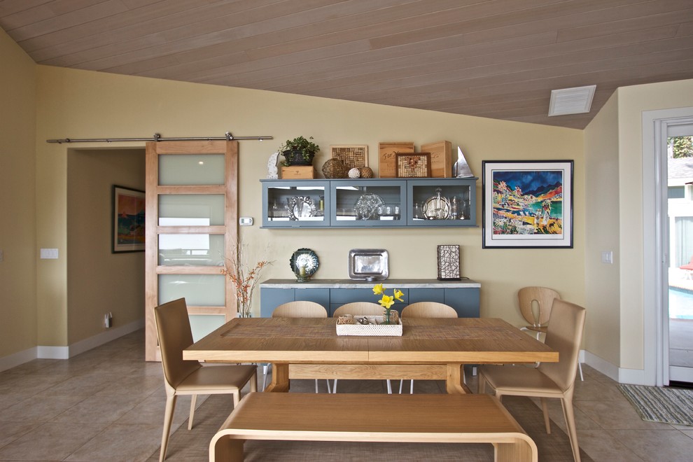 Example of a transitional ceramic tile kitchen/dining room combo design in Orange County