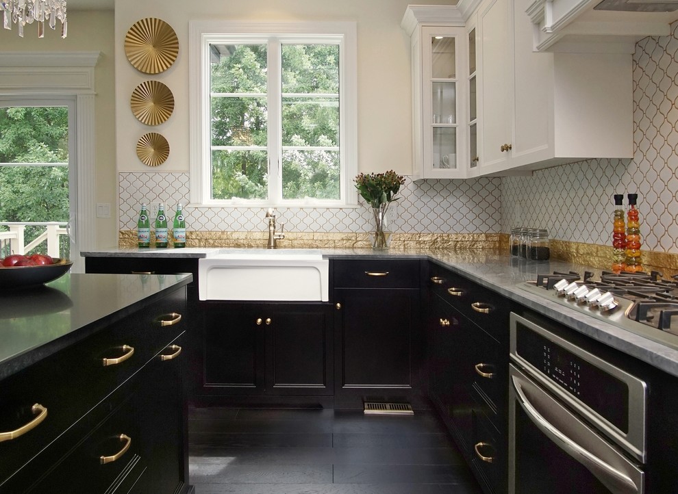 Inspiration for a modern u-shaped dark wood floor and black floor kitchen remodel in Chicago with a farmhouse sink, recessed-panel cabinets, black cabinets, granite countertops, white backsplash, ceramic backsplash, stainless steel appliances and an island
