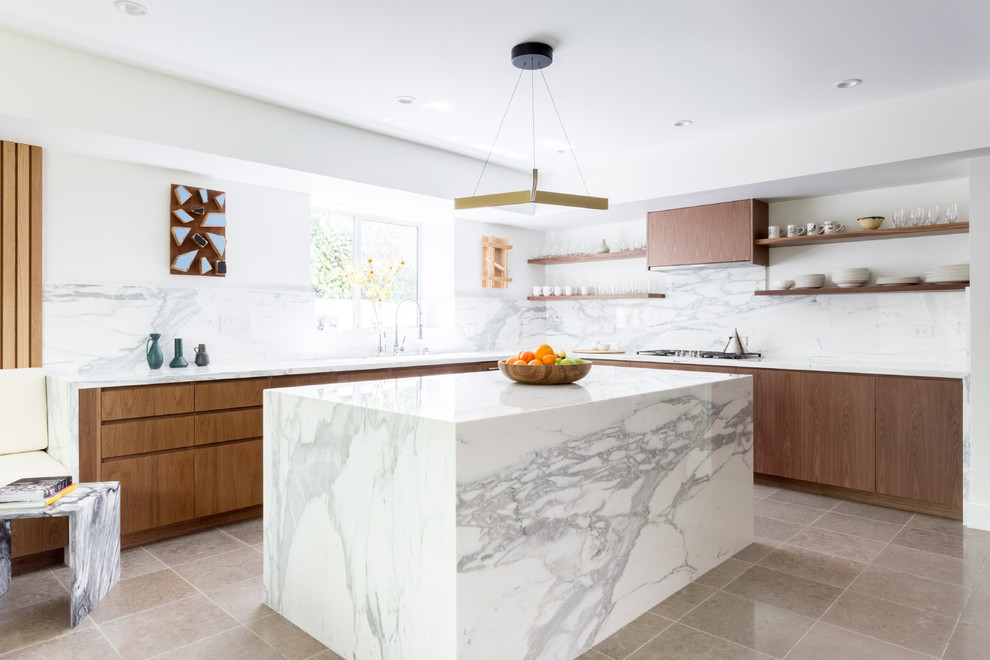 This is an example of a large contemporary l-shaped kitchen/diner in Los Angeles with a submerged sink, flat-panel cabinets, brown cabinets, marble worktops, white splashback, marble splashback, integrated appliances, ceramic flooring, an island and grey floors.