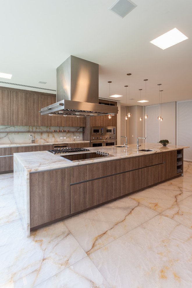 Large contemporary galley kitchen/diner in Orange County with a submerged sink, flat-panel cabinets, brown cabinets, wood worktops, marble flooring and an island.