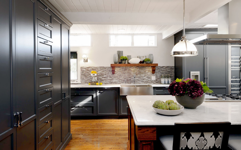 Inspiration for a transitional kitchen remodel in Other with a farmhouse sink, recessed-panel cabinets, multicolored backsplash, matchstick tile backsplash and paneled appliances