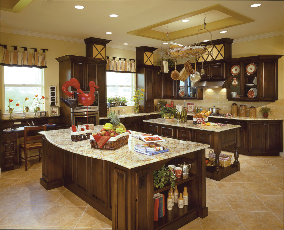 Huge country u-shaped ceramic tile open concept kitchen photo in Miami with a farmhouse sink, recessed-panel cabinets, dark wood cabinets, granite countertops, yellow backsplash, ceramic backsplash, stainless steel appliances and two islands