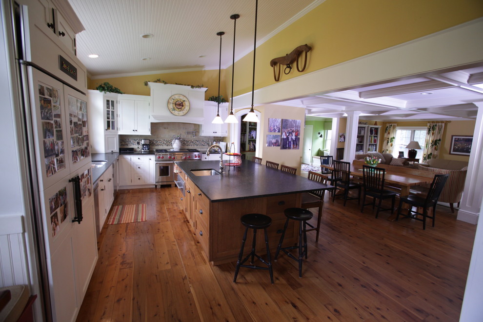 Photo of a country kitchen in Detroit with recessed-panel cabinets.