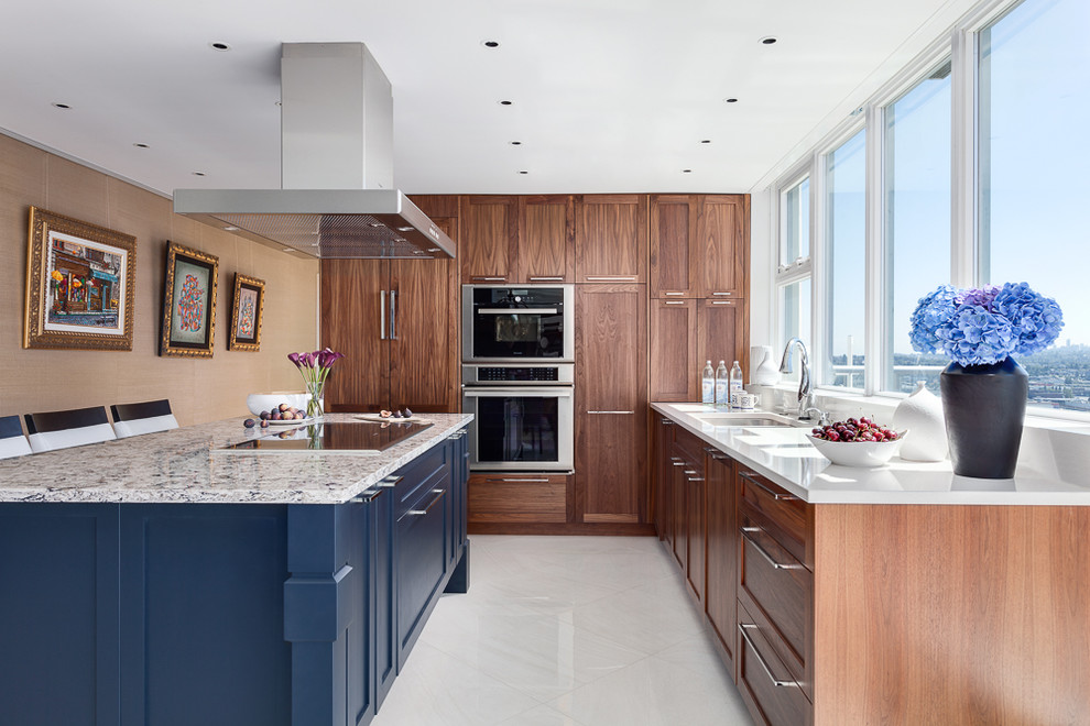 Mid-sized transitional galley open concept kitchen photo in Vancouver with an undermount sink, shaker cabinets, dark wood cabinets and an island