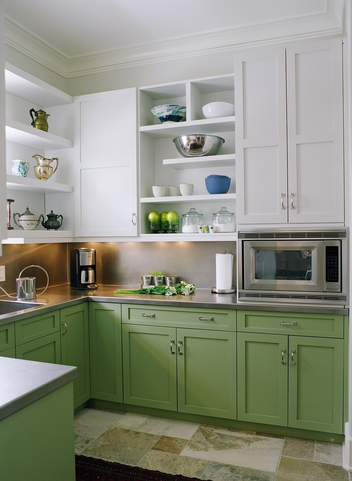 Inspiration for a timeless u-shaped multicolored floor enclosed kitchen remodel in Nashville with stainless steel appliances, green cabinets, stainless steel countertops, an integrated sink, shaker cabinets, metallic backsplash and no island