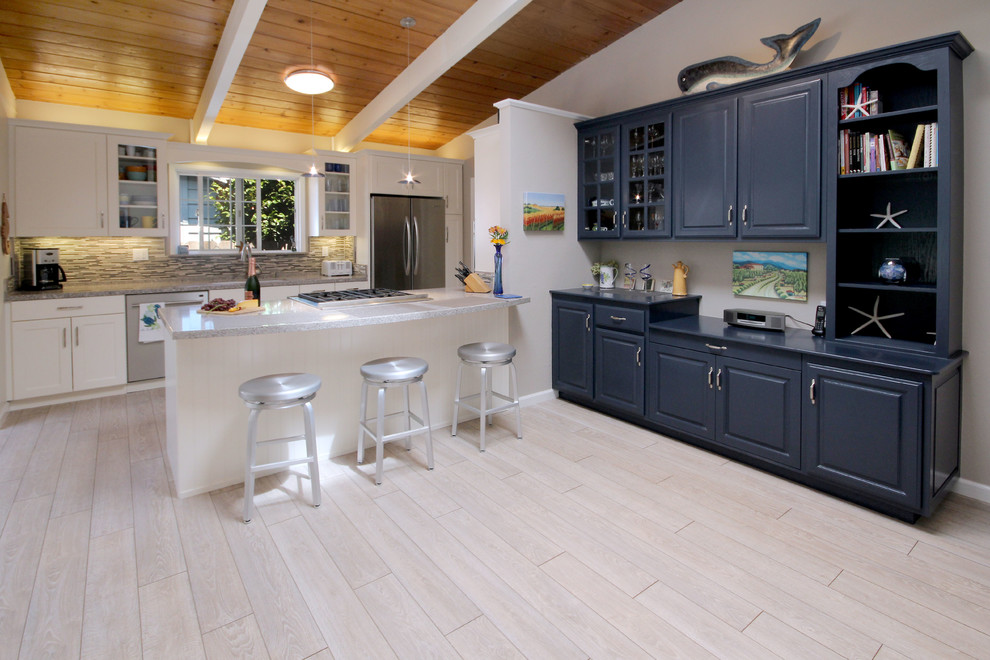 Beach style galley kitchen in Other.