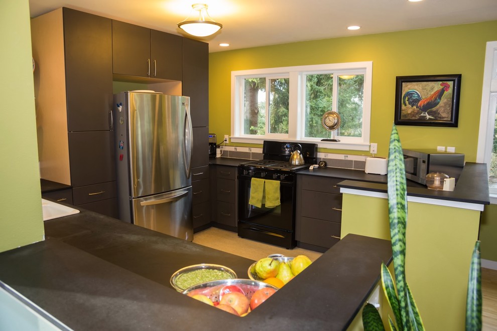Photo of a medium sized modern u-shaped enclosed kitchen in Seattle with a double-bowl sink, flat-panel cabinets, grey cabinets, composite countertops, grey splashback, porcelain splashback, stainless steel appliances, bamboo flooring and a breakfast bar.