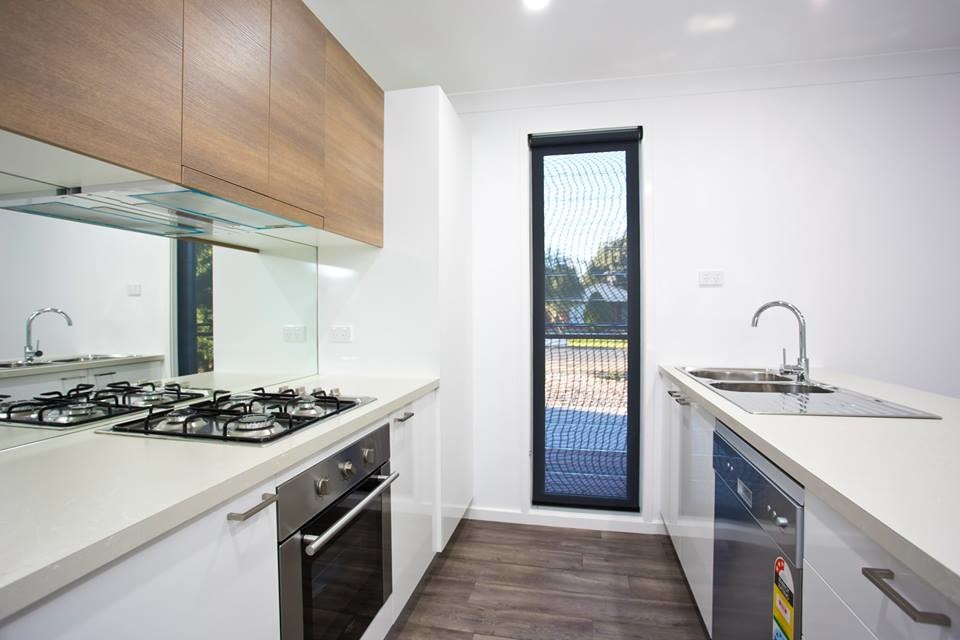 Photo of a contemporary kitchen in Newcastle - Maitland.