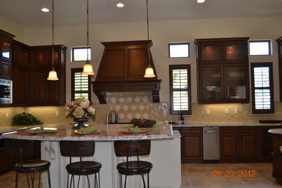 Example of a tuscan kitchen design in Los Angeles