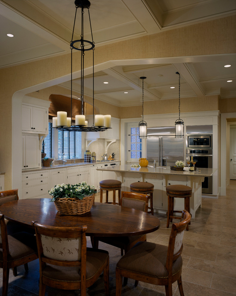 Large elegant l-shaped limestone floor eat-in kitchen photo in Other with beaded inset cabinets, white cabinets, marble countertops, a double-bowl sink, stainless steel appliances and an island
