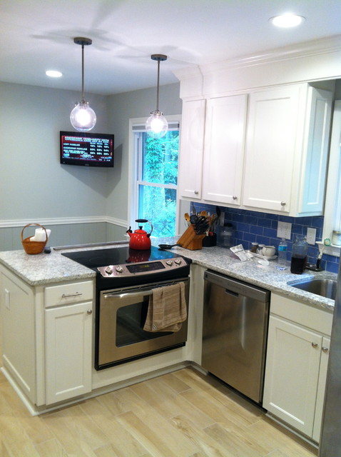 Shaker Style Cabinets with Crown Molding and Gray Granite Countertops ...