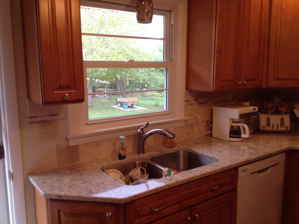 This is an example of a medium sized classic kitchen in Other.