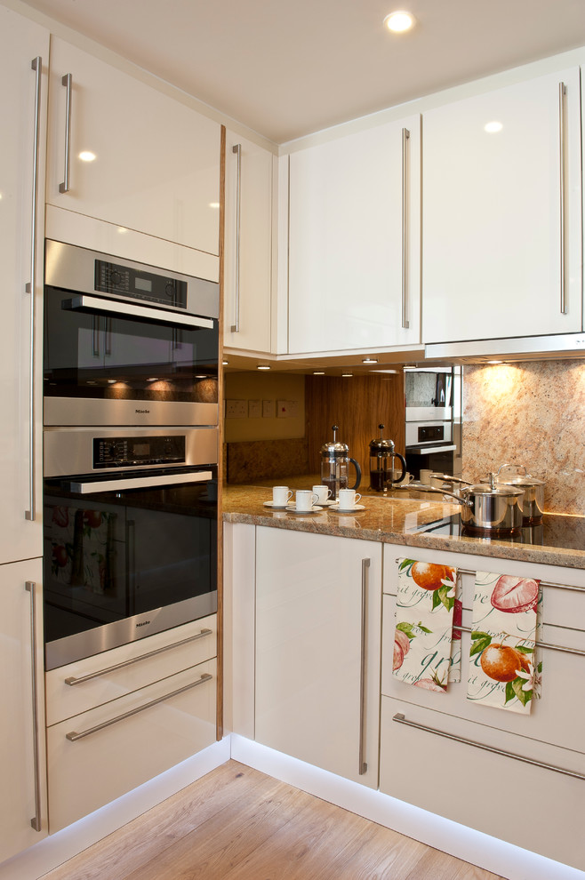 Photo of a contemporary kitchen in Dorset with marble worktops.