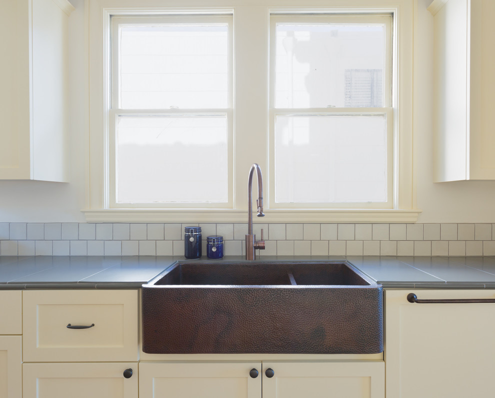Short backsplash made up of 4x4 tiles in Gardenia. - Craftsman - Kitchen - San Francisco - by Fireclay Tile