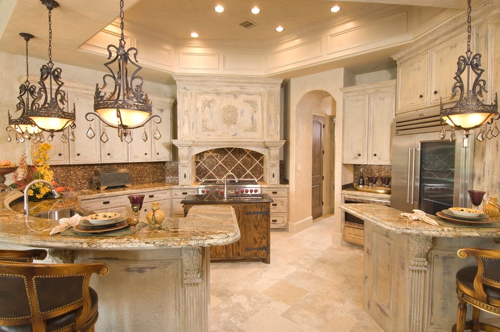 Example of a tuscan kitchen design in Houston with granite countertops, stainless steel appliances, distressed cabinets and brown backsplash