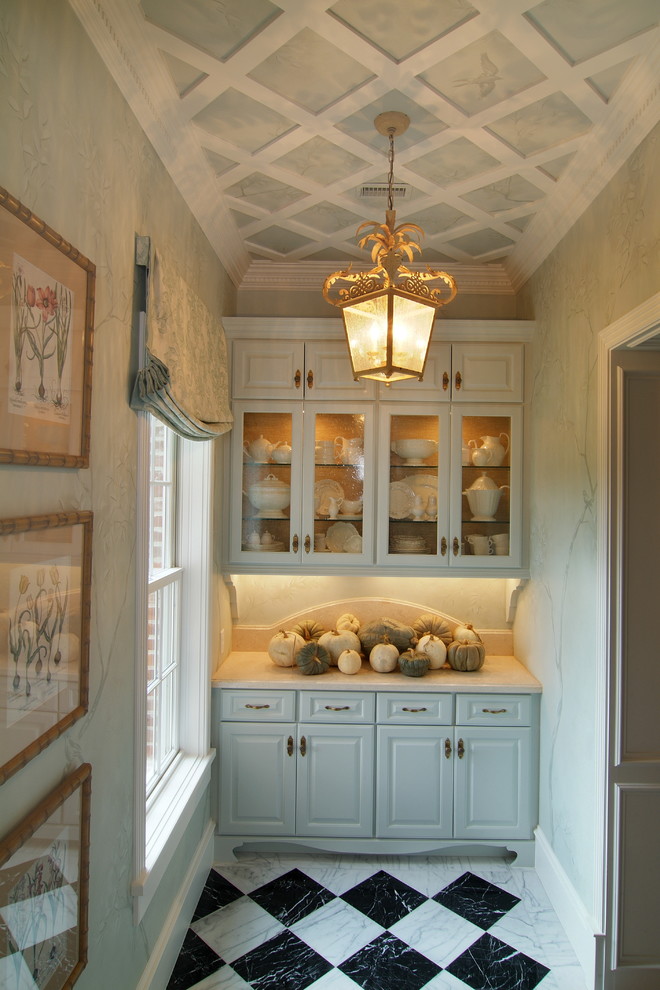 Example of a classic kitchen design in Houston with glass-front cabinets and gray cabinets