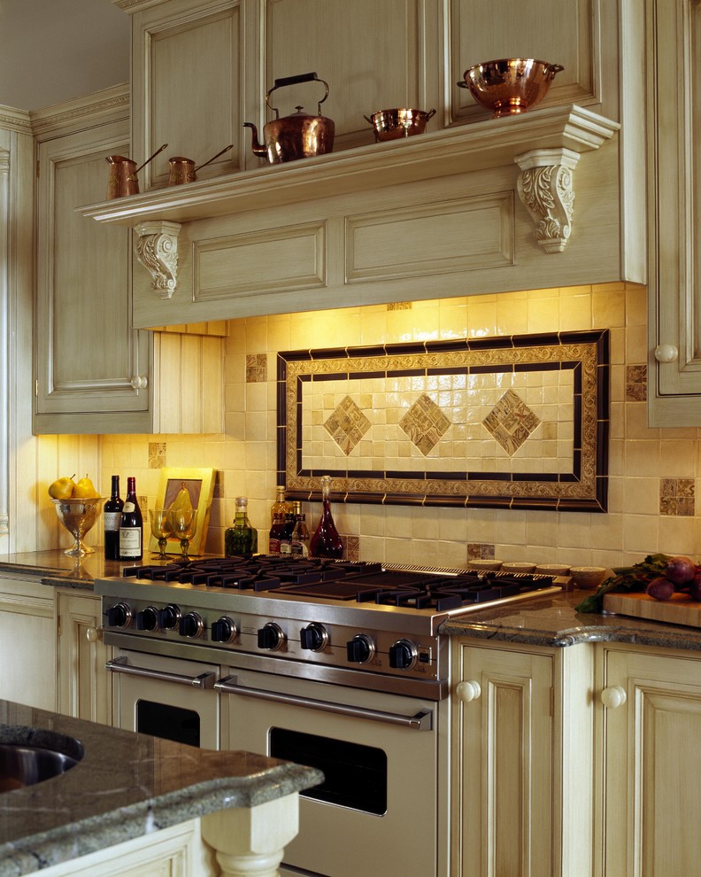Example of a classic kitchen design in Boston with white appliances and granite countertops