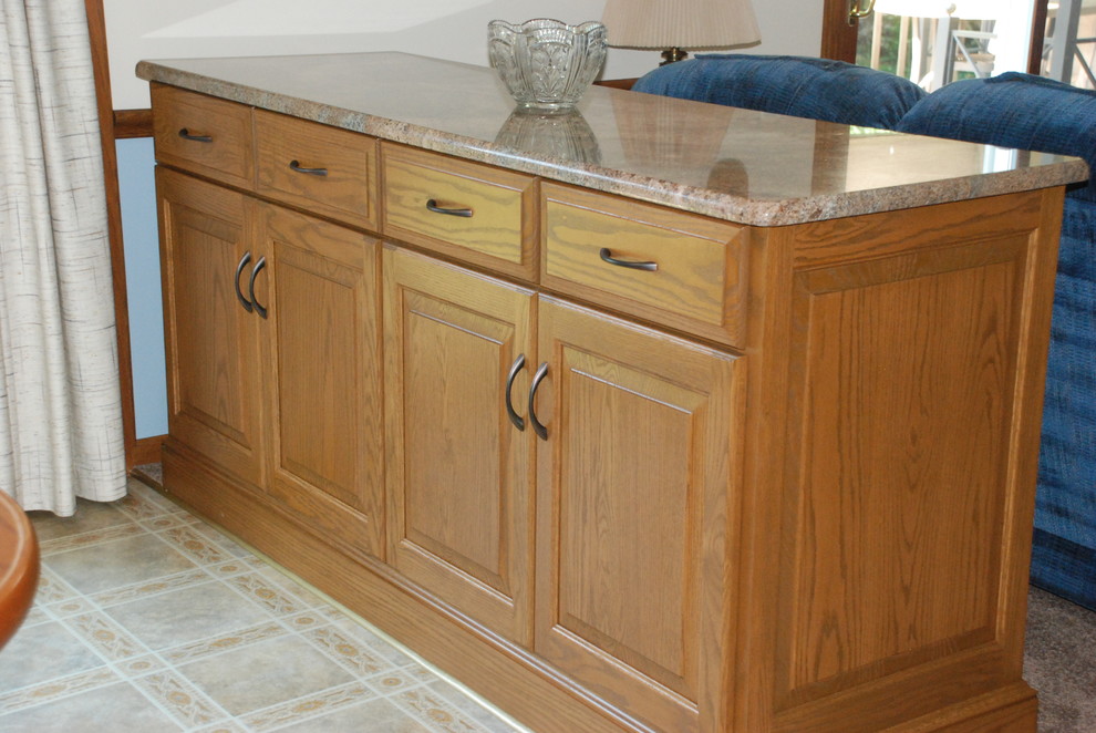 Sideboard, new doors, and new granite counters Traditional