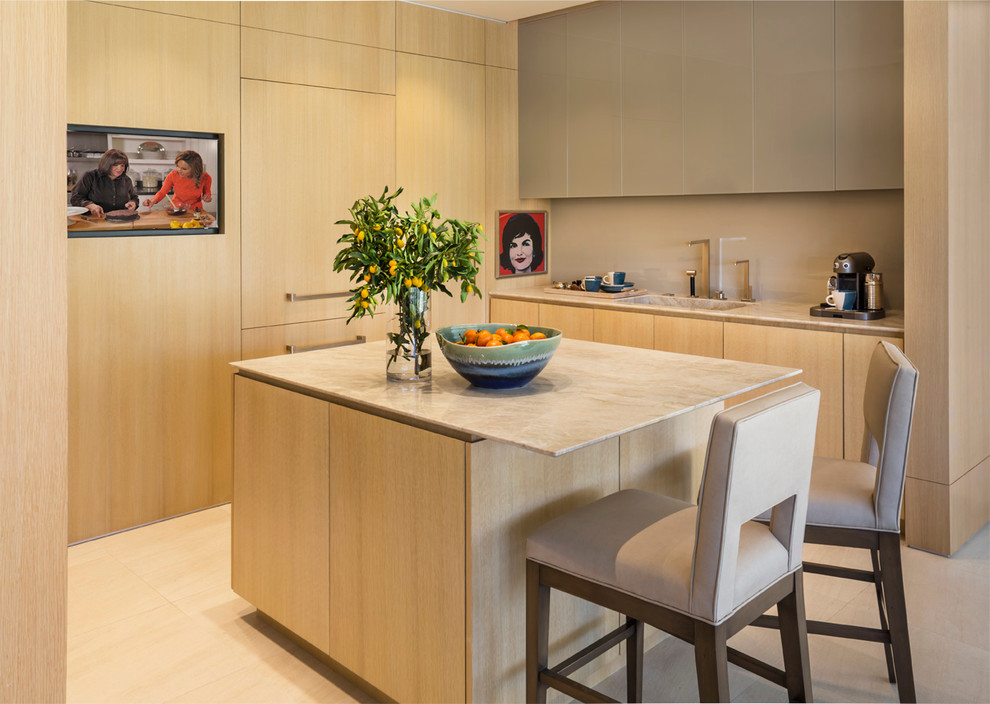 Small contemporary u-shaped kitchen in Los Angeles with an integrated sink, flat-panel cabinets, light wood cabinets, quartz worktops, beige splashback, glass sheet splashback, integrated appliances, porcelain flooring and an island.