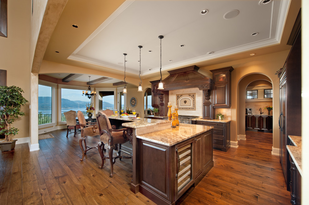 Example of a tuscan kitchen design in Vancouver