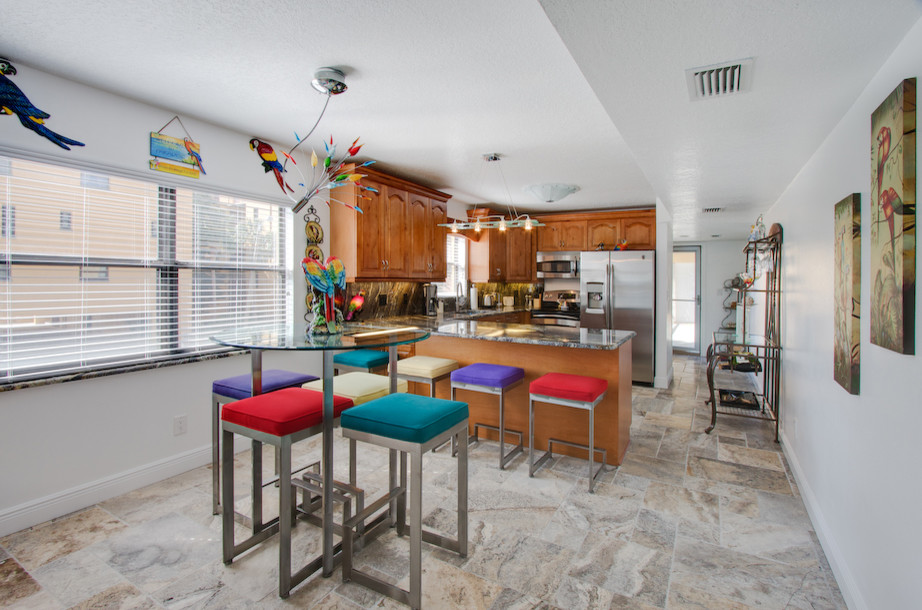 This is an example of an eclectic kitchen in Tampa.