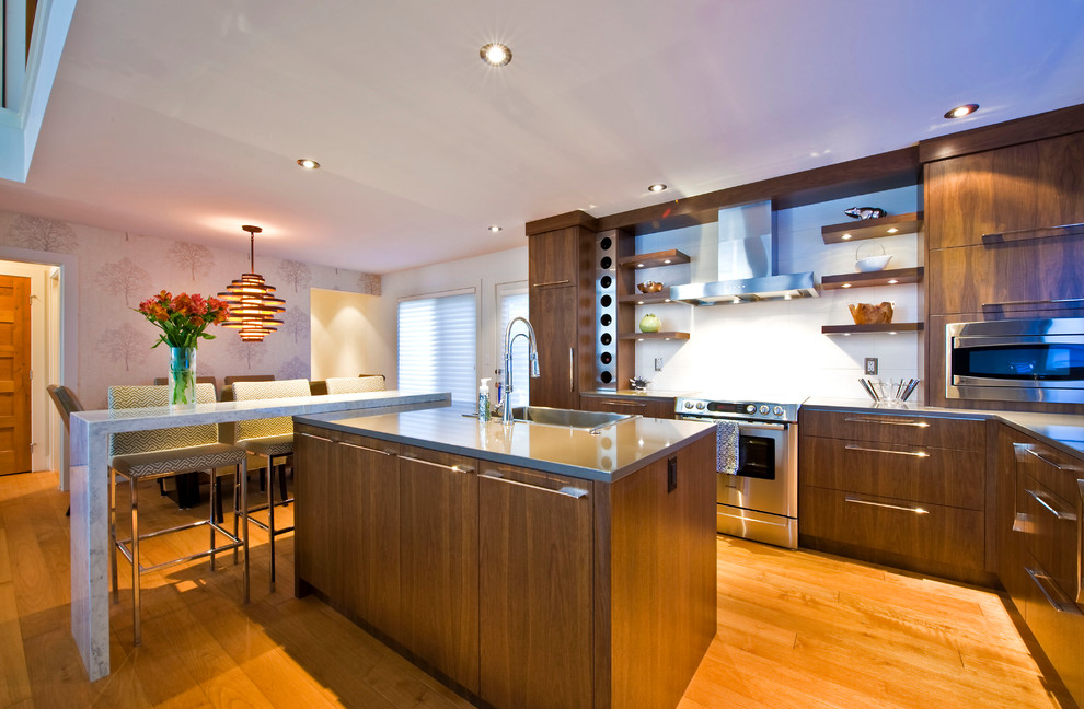 Photo of a contemporary kitchen in Calgary with stainless steel appliances.