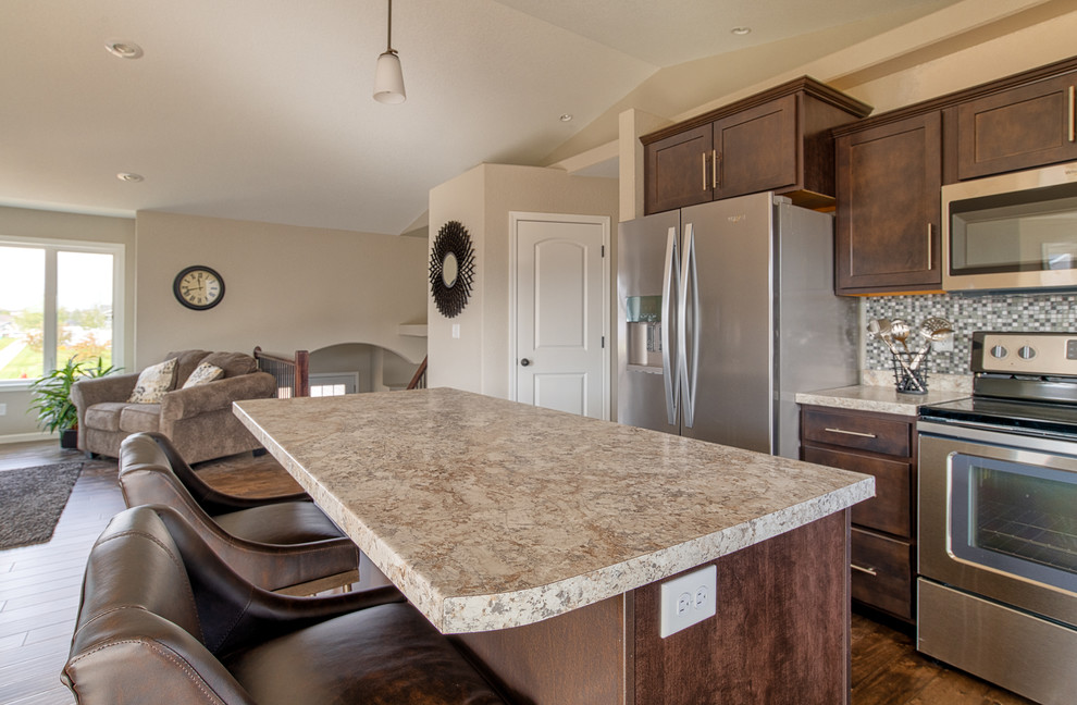 Simple, Warm Laminate Kitchen w/ an Island Countertop Contemporary