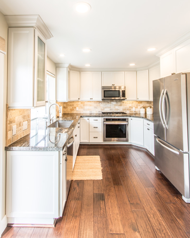 Photo of a medium sized traditional kitchen in Orange County with a single-bowl sink, granite worktops, stainless steel appliances and medium hardwood flooring.