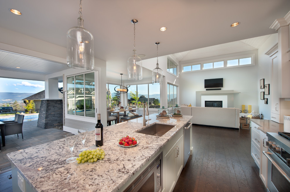 Trendy kitchen photo in Vancouver with granite countertops